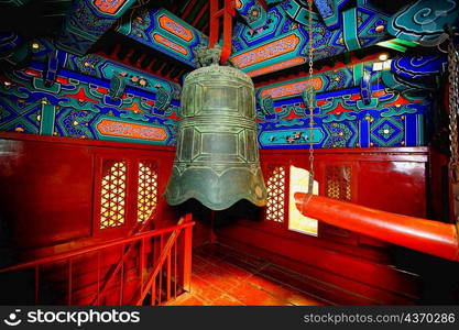 Bell hanging in a temple, Beihai Park, Beijing, China