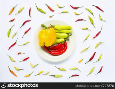 Bell pepper and chili peppers isolated on white background