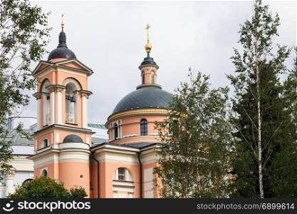 Bell tower and Church the Temple of Barbara the Great Martyr on Varvarka street in Moscow in september
