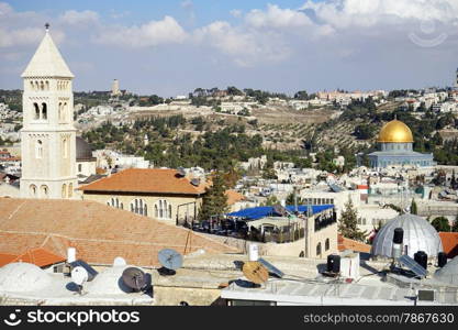 Bell tower and golden dome in Old city of Jerusalem, Isrsel