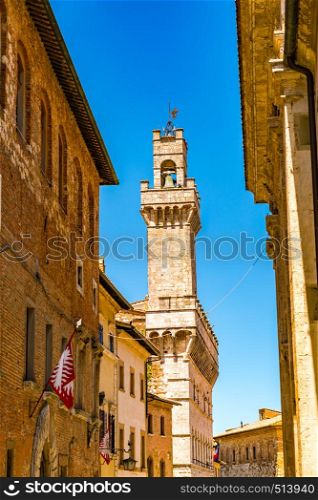 Bell tower in hill top city of Montepulciano Italy in summer sunny day