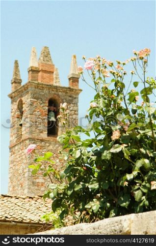 Bell tower of a church, Romanesque Church, Piazza Roma, Monteriggioni, Siena Province, Tuscany, Italy