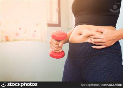 Belly fat woman holding dumbbell, Woman diet lifestyle concept