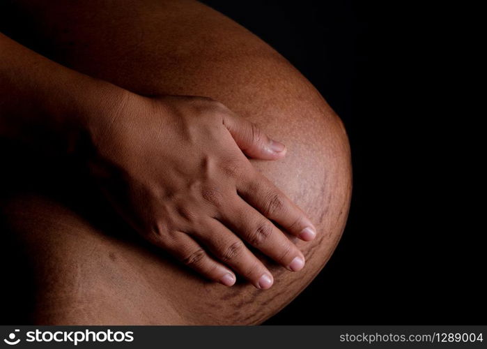 Belly of a pregnant woman