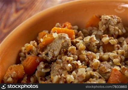 Belorussian Buckwheat porridge vegetables und with pork .closeup