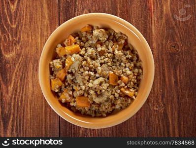 Belorussian Buckwheat porridge vegetables und with pork .closeup