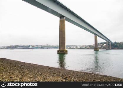 Below a metal lined bridge. Cleddau Bridge, between Neyland and Pembroke Dock, Pembrokeshire, Wales, United Kingdom.