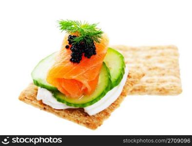 Beluga Caviar on fresh, raw salmon with baby cucumber and goat cheese; garnished with a sprig of fresh dill.