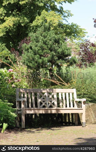 bench in a beautiful garden. garden bench