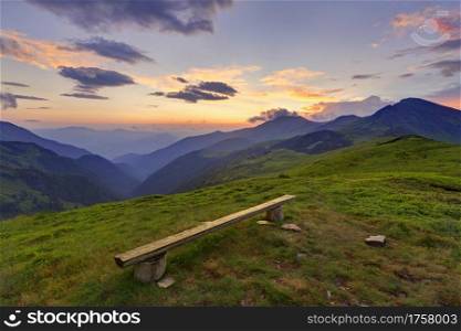Bench in a very picturesque mountain location in beautiful Rodna mountains, Romania, Europe. Bench in a very picturesque mountain location in beautiful Rodna mountains in Romania
