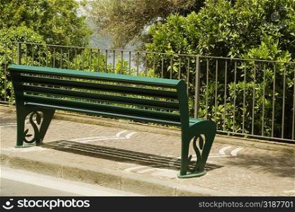Bench on the sidewalk, Via Padre Reginaldo Giuliani, Sorrento, Sorrentine Peninsula, Naples Province, Campania, Italy