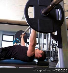 Bench press weightlifting man with in fitness gym
