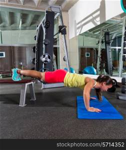 bench push up woman at gym workout exercise