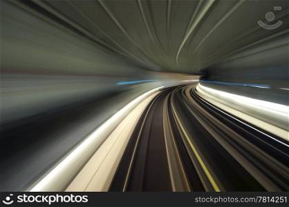 Bend in a subway tunnel, seen from the cockpit using a long exposure