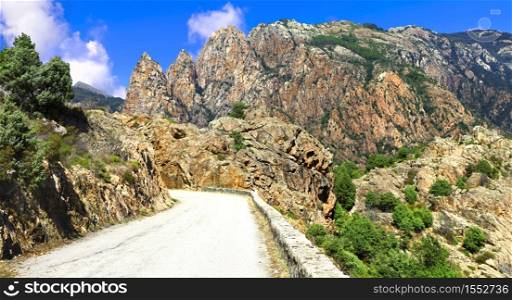 bending roads in high mountains of beautiful Corsica islnad. Roads and wonderful nature of Corsica. France