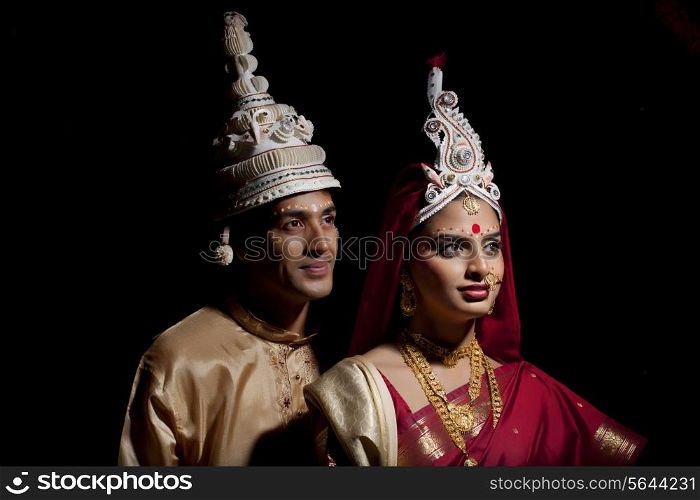 Bengali bride and groom with a topor