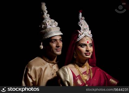 Bengali bride and groom with a topor