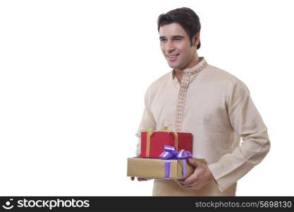 Bengali man holding gifts