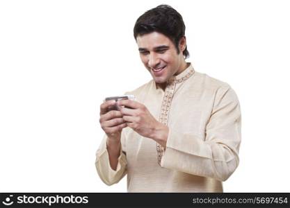 Bengali man reading an sms