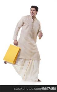 Bengali man running with shopping bags