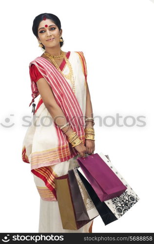 Bengali woman carrying shopping bags