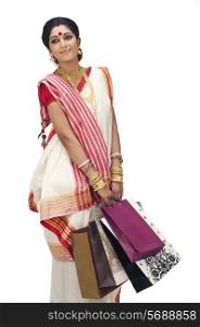 Bengali woman carrying shopping bags