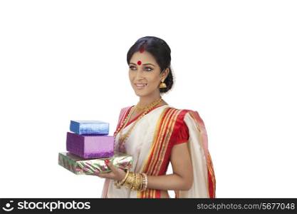 Bengali woman holding gifts