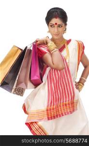 Bengali woman holding shopping bags