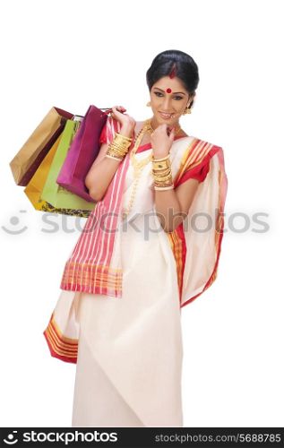Bengali woman holding shopping bags