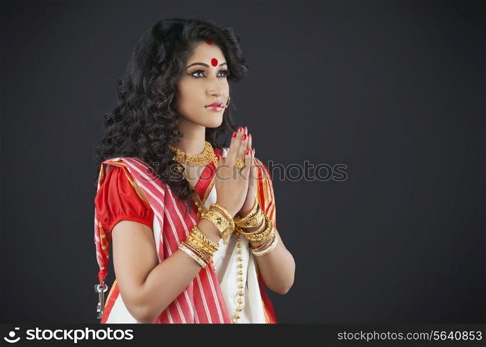 Bengali woman praying