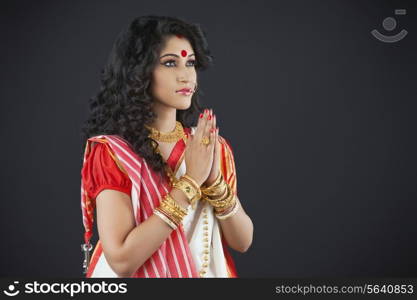 Bengali woman praying