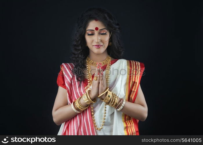 Bengali woman praying