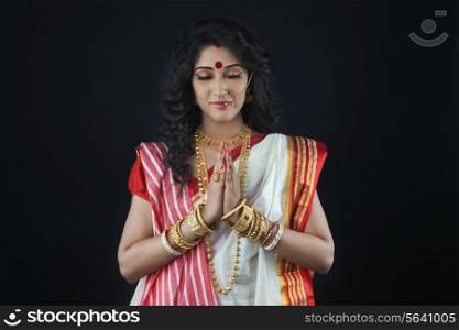 Bengali woman praying