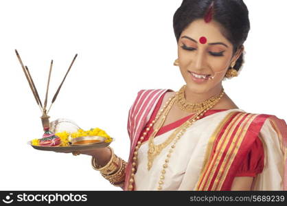 Bengali woman with puja thali