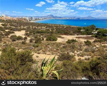 Benidorm city coast summer view (Costa Blanca, Alicante, Spain). All people are unrecognizable.
