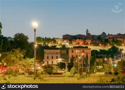 Bergamo at sunset.. Bergamo at sunset in the light of lanterns. Italy. Lombardy.