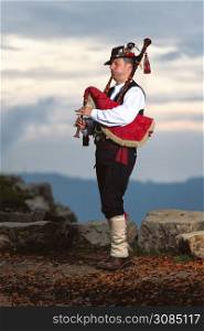Bergamo Bagpipe. Player with traditional costume.