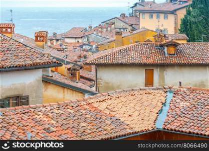 Bergamo. View of the old town.. Scenic view of stone towers and tiled roofs in the old historic part of town. Bergamo. Italy.