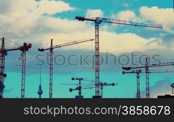 Berlin construction area with cranes working on windy weather