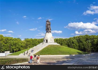 Berlin, Germany - August 14, 2019: Tourists visiting the Soviet War Memorial in the Treptower Park in Berlin, Germany. Tourists visiting the Soviet War Memorial - Treptower Park. Berlin, Germany