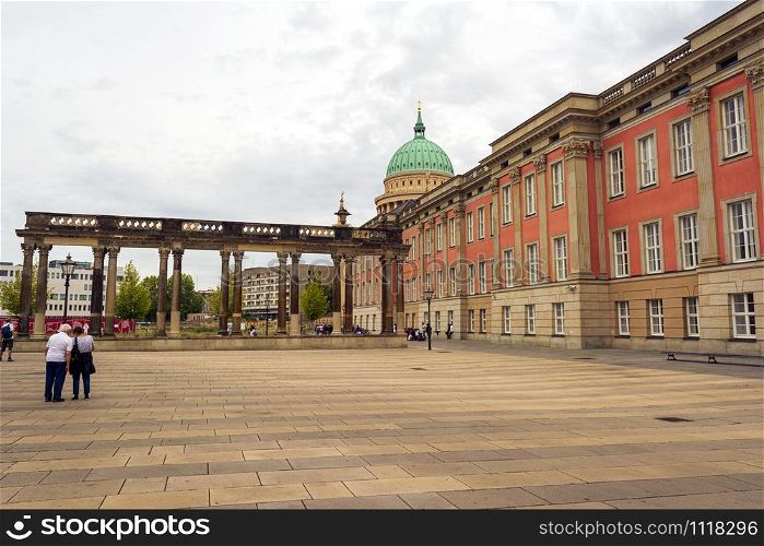 Berlin, Germany - August 17 2019 - Outdoor scenery of buildings around street, am alten markt which is an old historical market square in Potsdam, Germany. Outdoor scenery of buildings around street, am alten markt which is an old historical market square in Potsdam, Germany