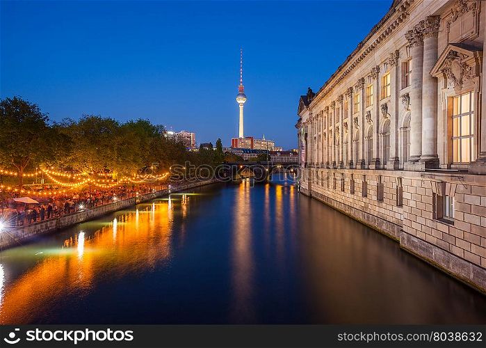 Berlin&rsquo;s River Spree, TV Tower, and side of the Bode Museum at dusk