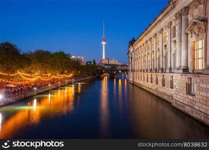 Berlin&rsquo;s River Spree, TV Tower, and side of the Bode Museum at dusk