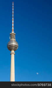 Berlin Television Tower, Berliner Fernsehturm and Moon against a blue sky, Berlin, Germany