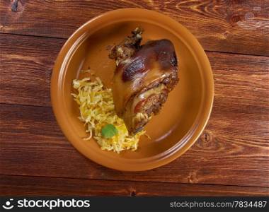 Berliner Eisbein.grilled knuckle of pork with sauerkraut