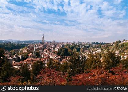 Bern old town with Evangelical church bell tower view from Rosengarten park in autumn season
