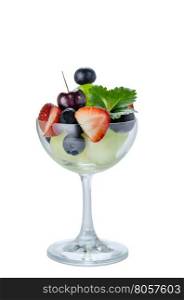 berries and melon. Fresh forest berries and melon in a glass on a white background isolated