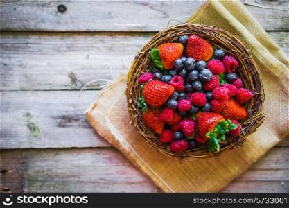 Berries on wooden background