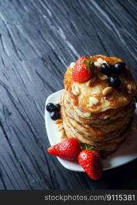 berries pancakes stack