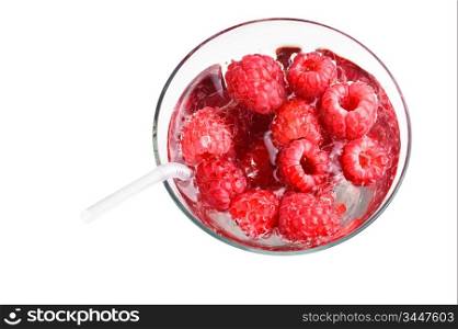 berries raspberries in a wineglassisolated on a white background